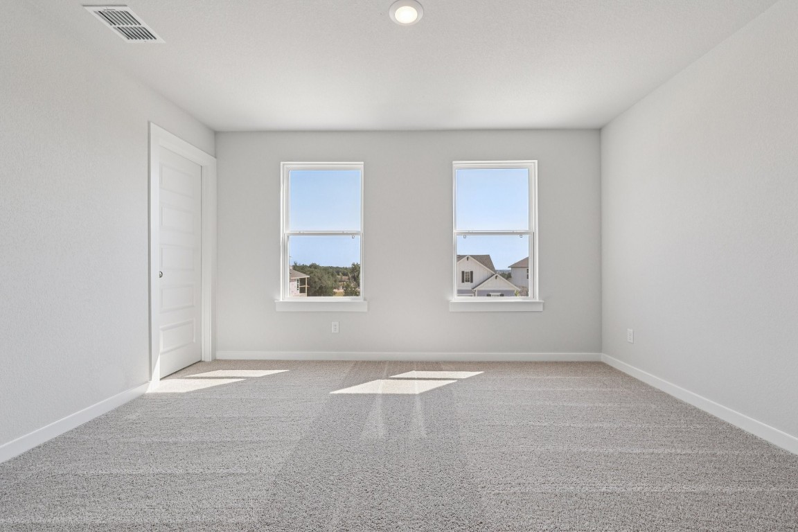 1216 Lavender Way Georgetown, TX 78628 - Photo 24 of 40 an empty room with windows