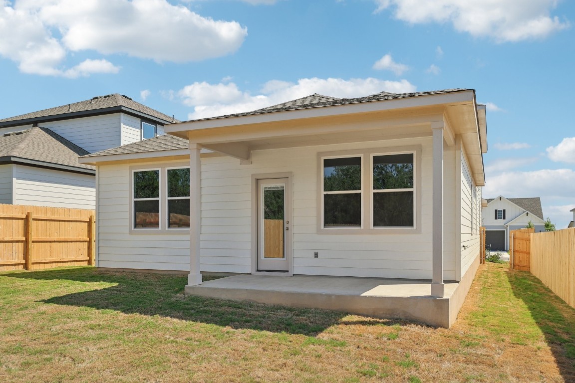 1216 Lavender Way Georgetown, TX 78628 - Photo 28 of 40 a front view of a house with a yard