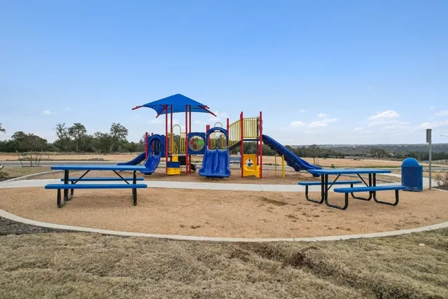 a view of a park with slide