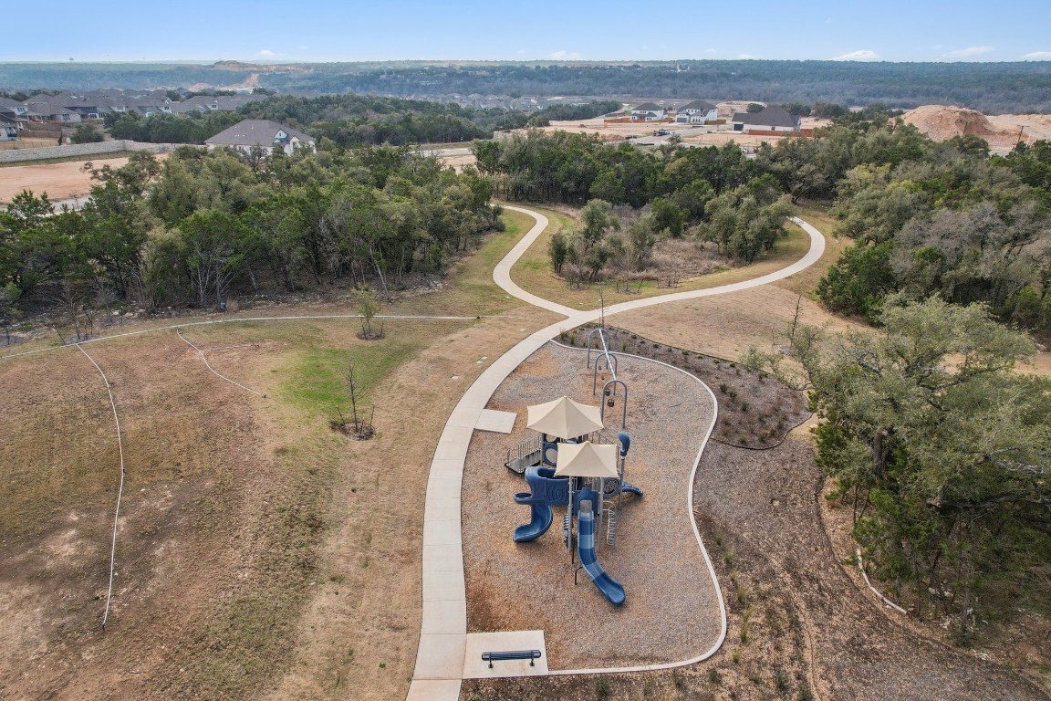 1216 Lavender Way Georgetown, TX 78628 - Photo 36 of 40 an aerial view of a house with a yard and lake view