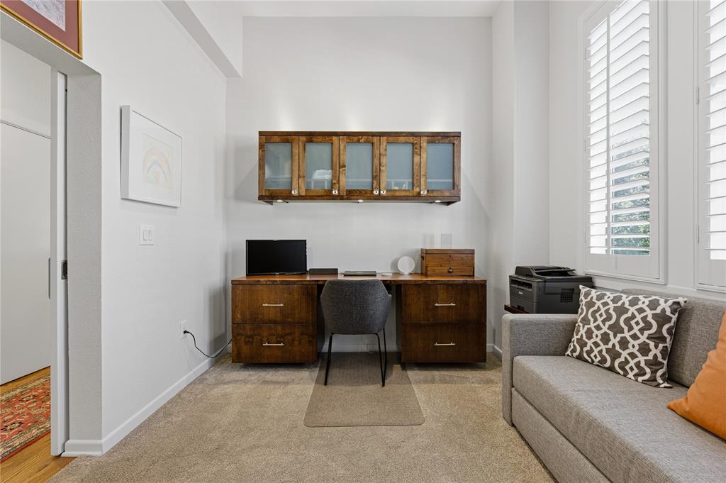 6269 Oram Street, Unit 23 Dallas, TX 75214 - Photo 26 of 39 a living room with furniture and a window