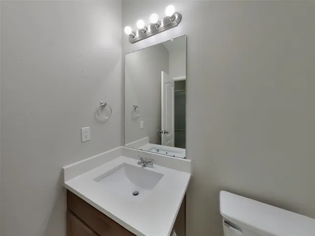 a bathroom with a bathtub and toilet