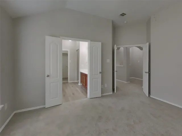 wooden floor and closet in a room