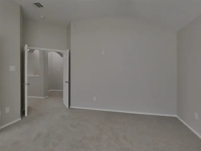 a bathroom with a sink double vanity and a mirror