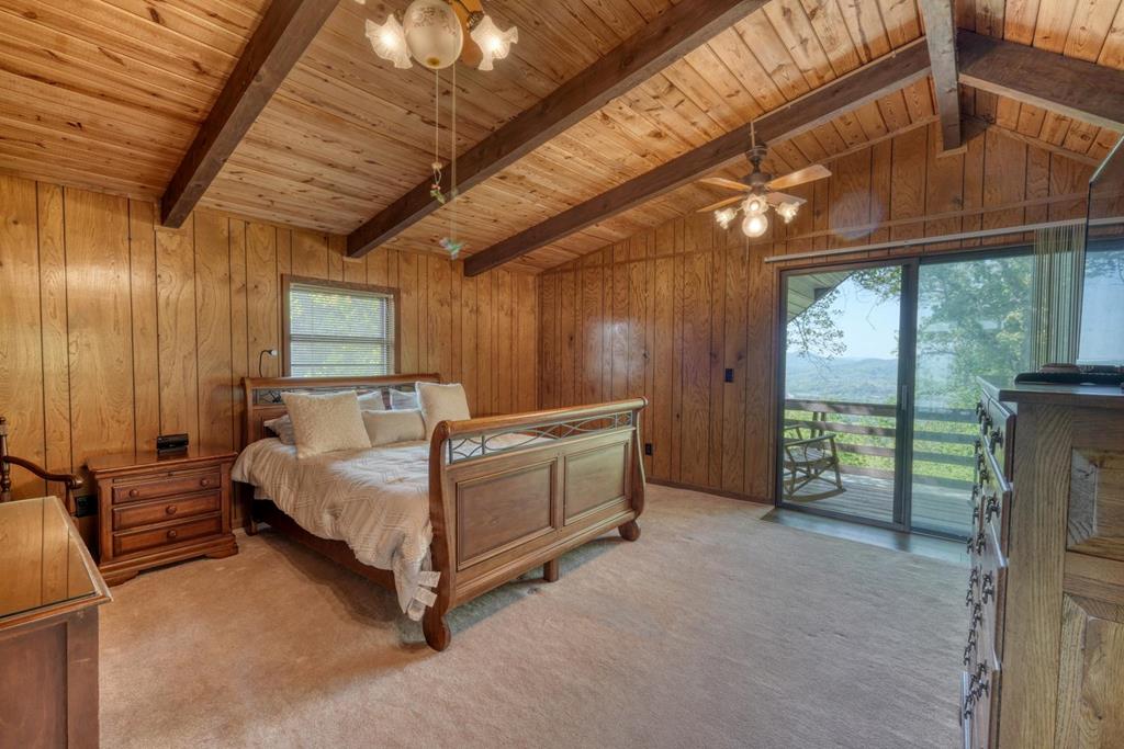 980 Mining Gap Road Young Harris, GA 30582 - Photo 30 of 70 a bed room with a bed and a television