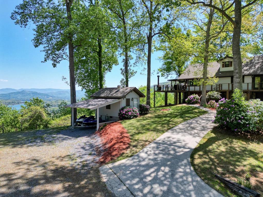 980 Mining Gap Road Young Harris, GA 30582 - Photo 58 of 70 a view of a backyard with sitting area