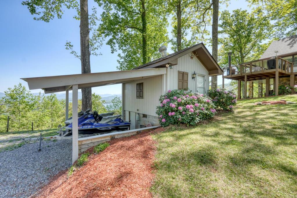 980 Mining Gap Road Young Harris, GA 30582 - Photo 65 of 70 a front view of a house with garden