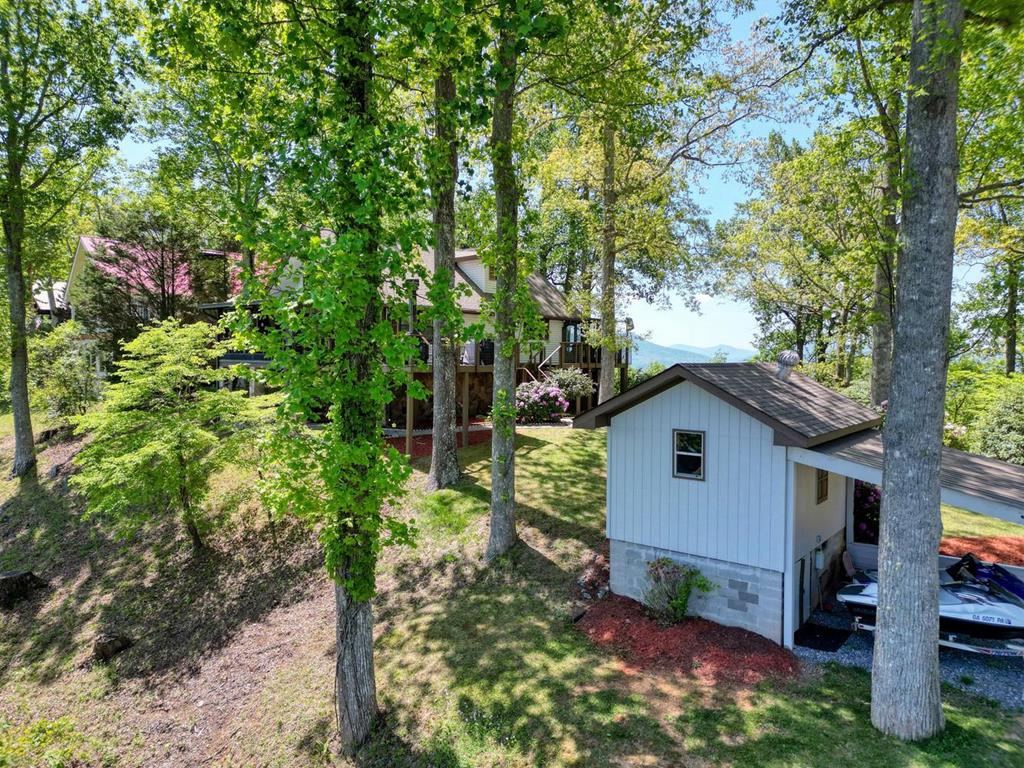 980 Mining Gap Road Young Harris, GA 30582 - Photo 69 of 70 a front view of a house with garden