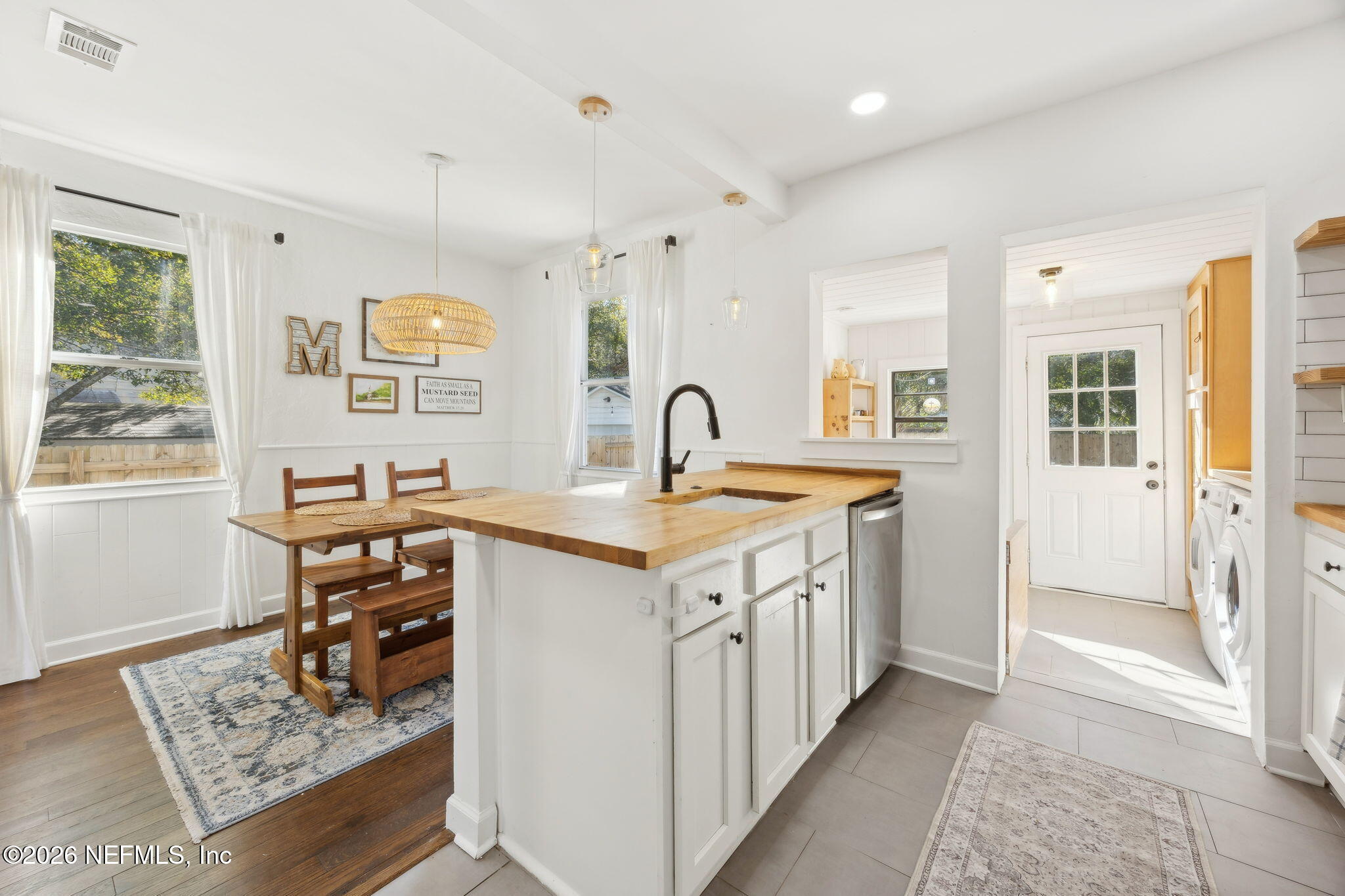 1171 Scotten Road Jacksonville, FL 32205 - Photo 11 of 30 a kitchen with sink stove and refrigerator