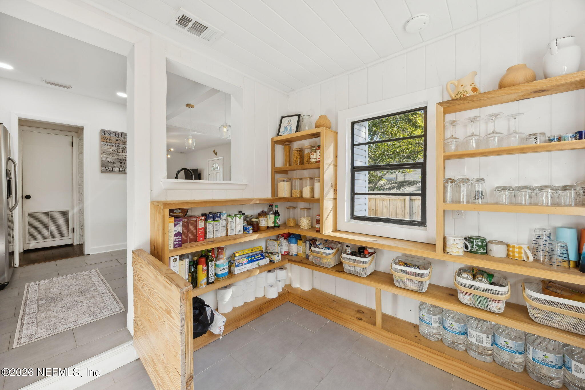 1171 Scotten Road Jacksonville, FL 32205 - Photo 14 of 30 a very nice looking room with a large window and a bed