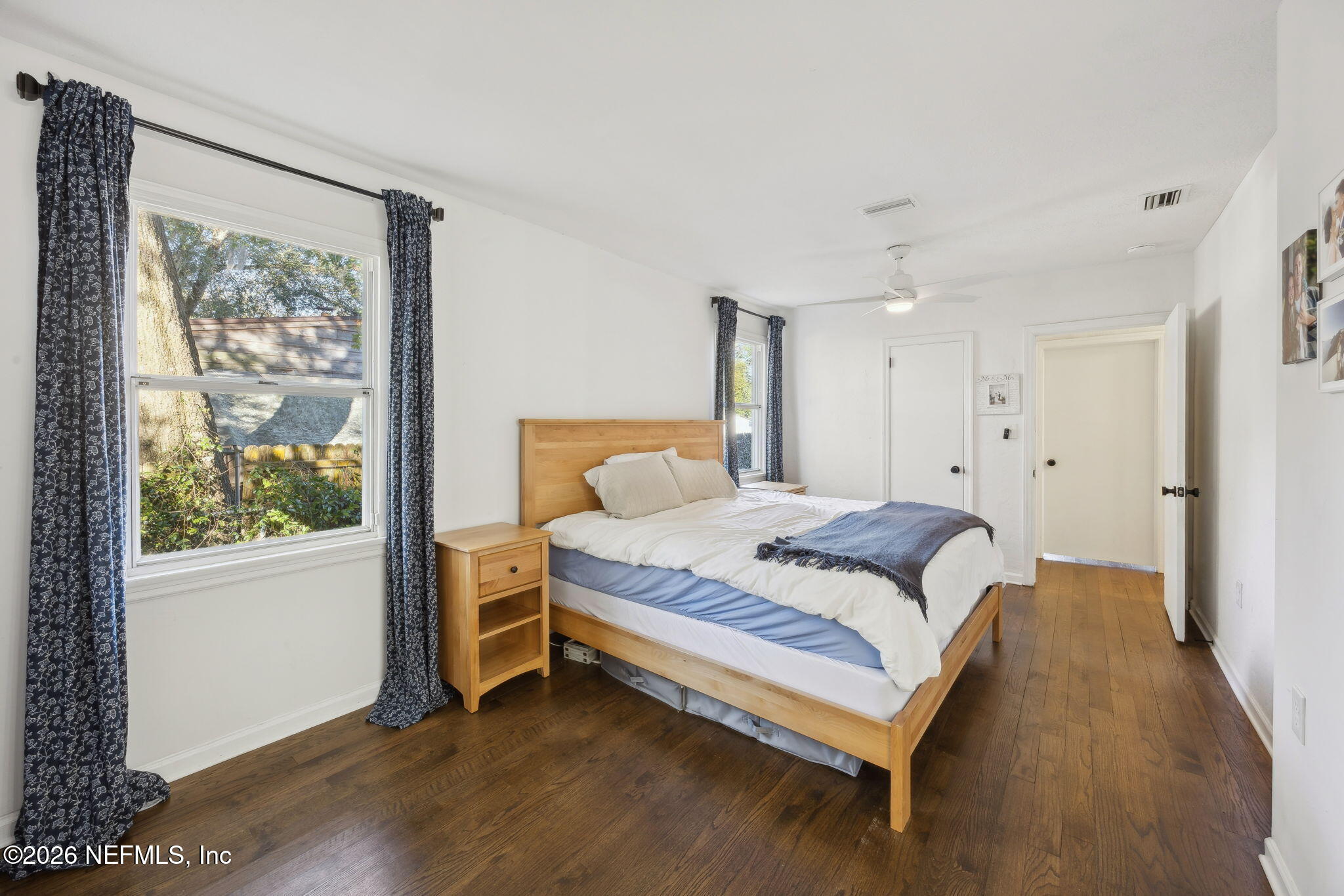 1171 Scotten Road Jacksonville, FL 32205 - Photo 17 of 30 a spacious bedroom with a bed and a window