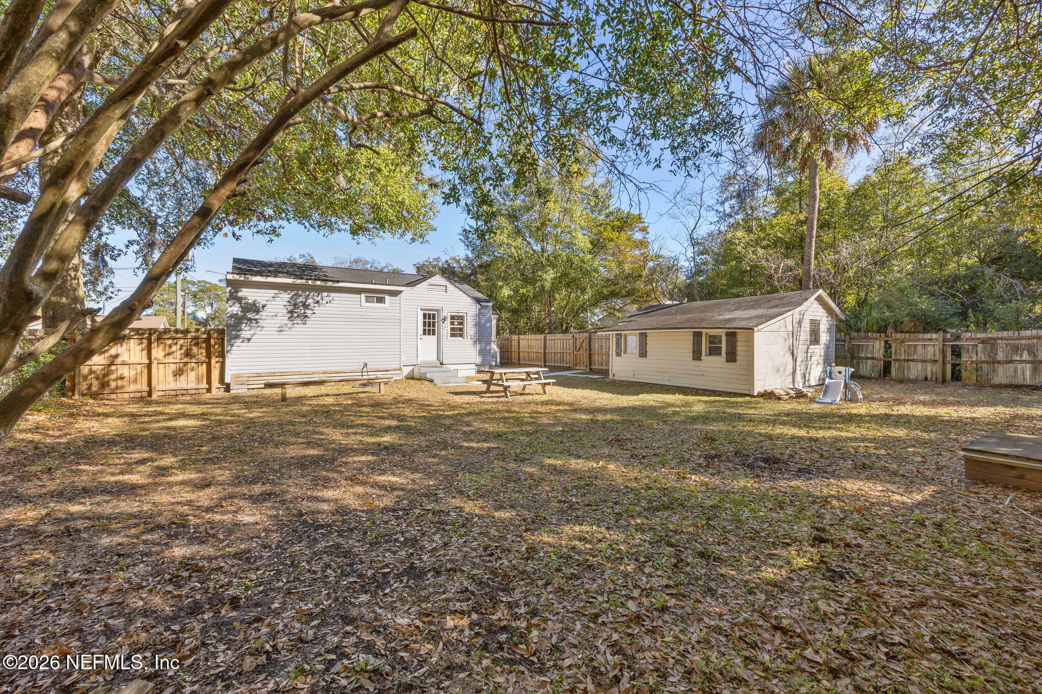 1171 Scotten Road Jacksonville, FL 32205 - Photo 29 of 30 a front view of a house with a yard