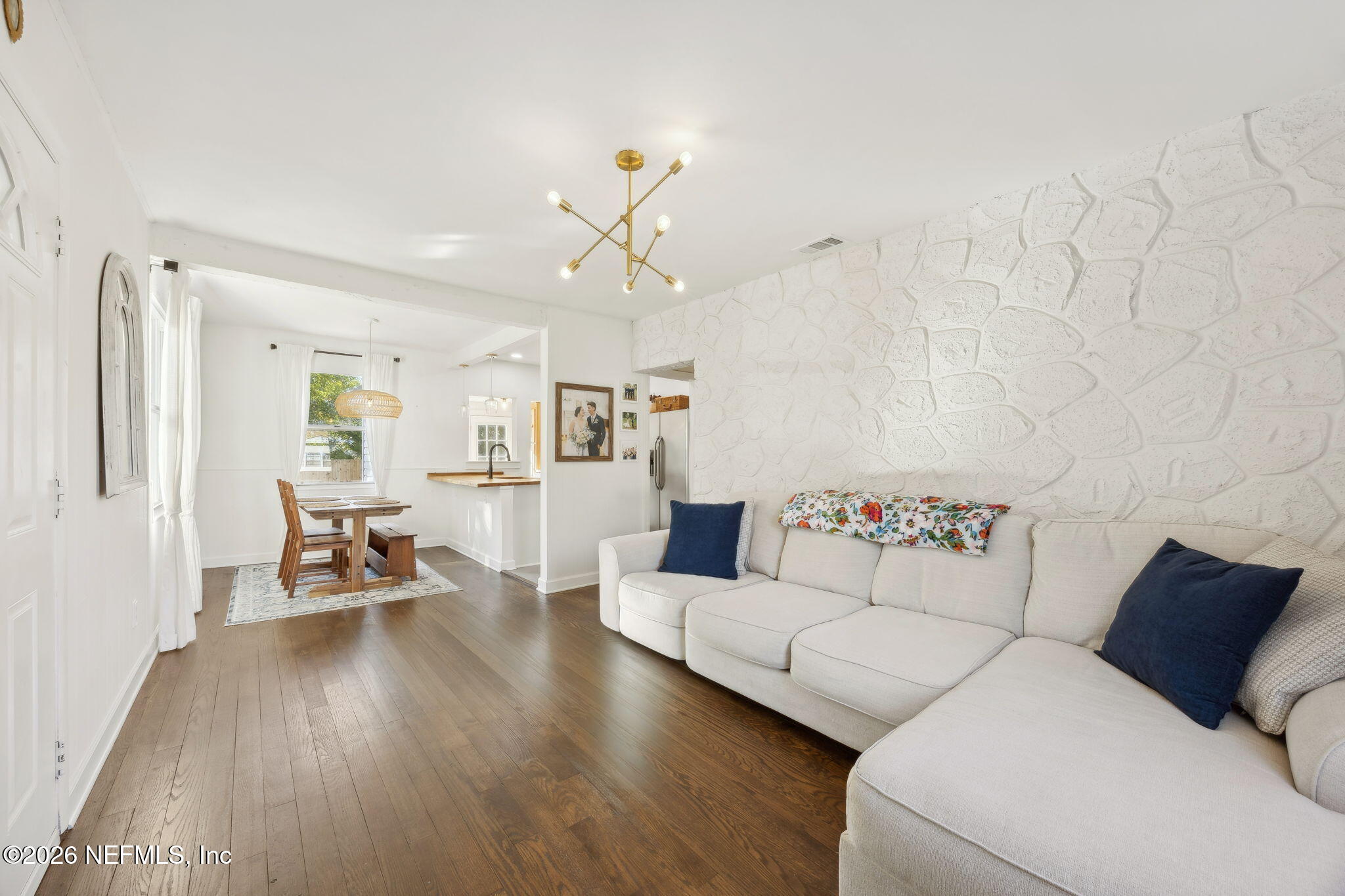 1171 Scotten Road Jacksonville, FL 32205 - Photo 7 of 30 a living room with furniture and wooden floor
