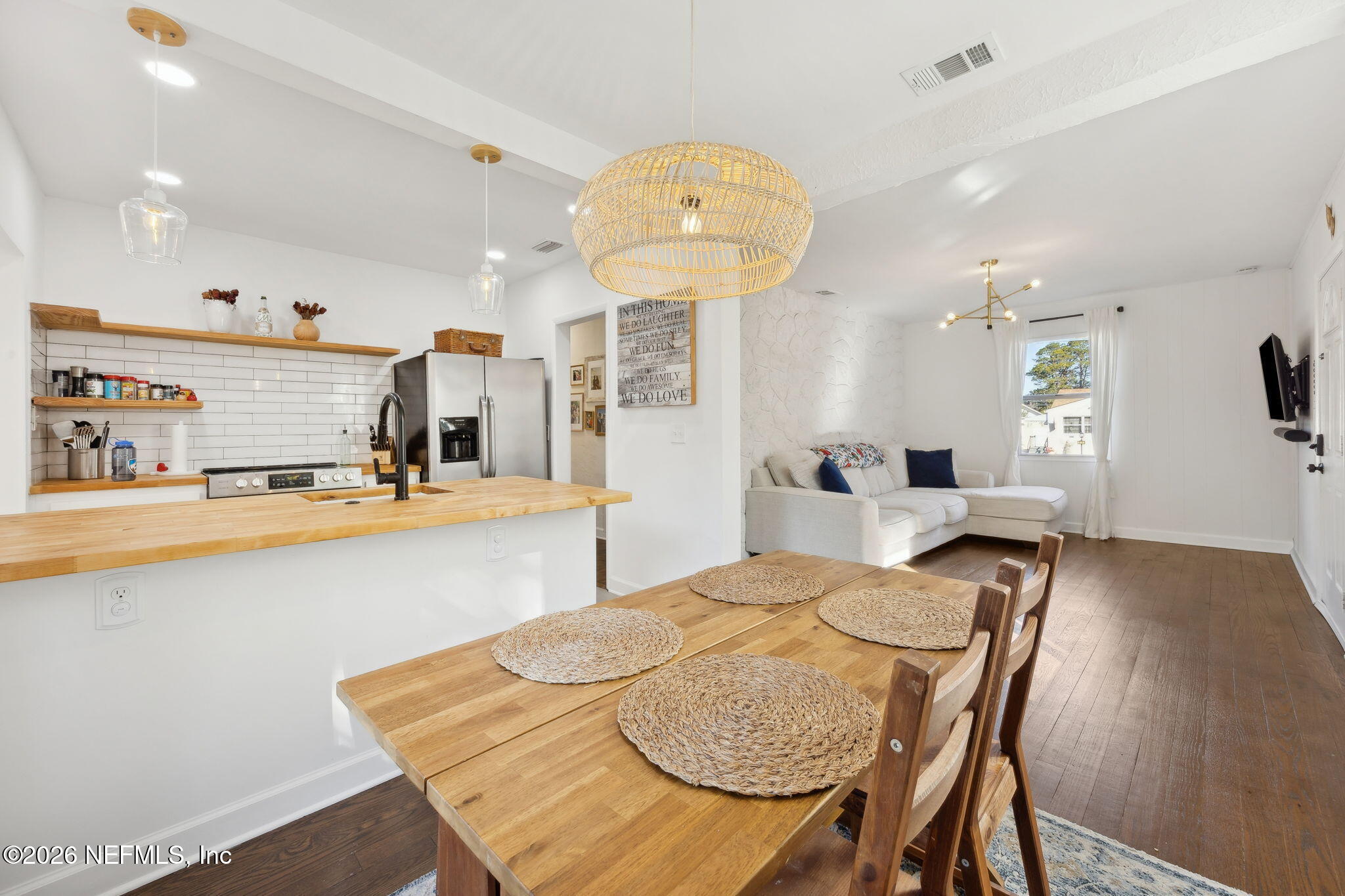 1171 Scotten Road Jacksonville, FL 32205 - Photo 8 of 30 a view of a dining room with furniture and wooden floor