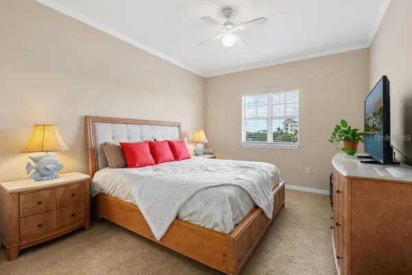 a bathroom with a granite countertop sink a toilet and a mirror