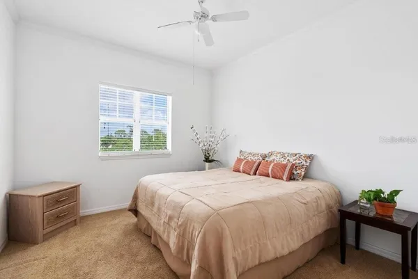 a view of a hallway with a chandelier