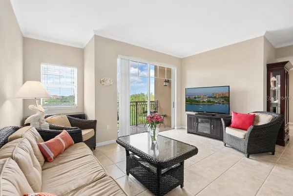 a view of a balcony with chairs
