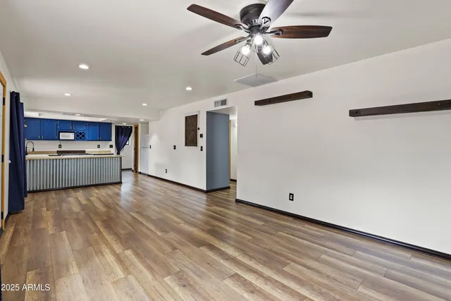 a view of a livingroom with hardwood