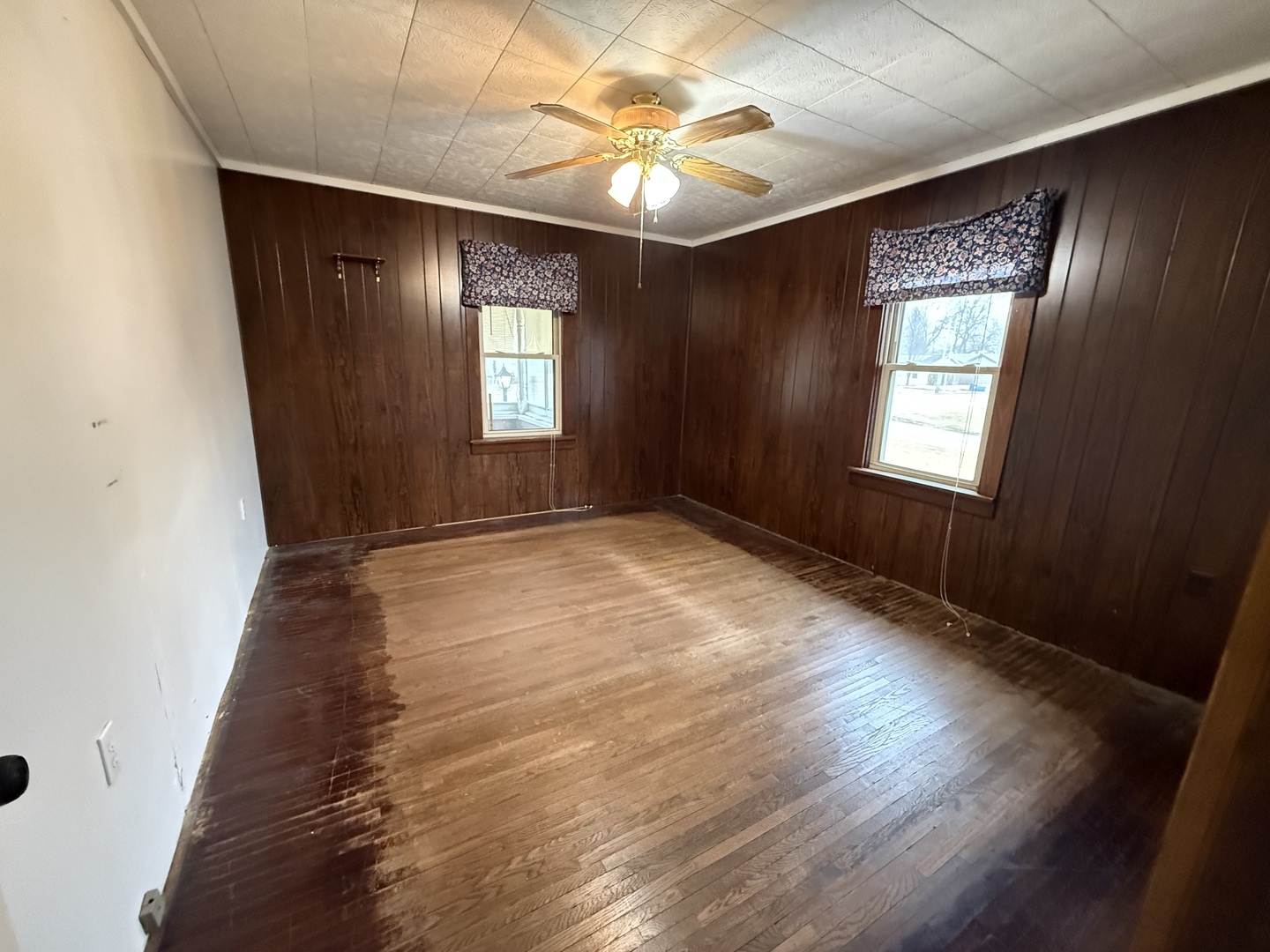1849 Post Street Ottawa, IL 61350 - Photo 11 of 22 wooden floor in an empty room with a window