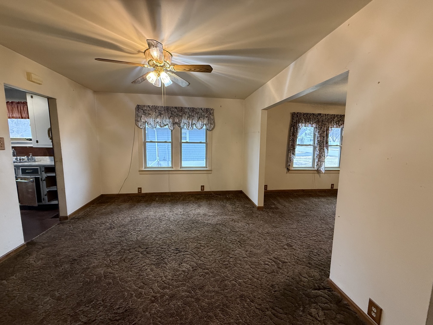 1849 Post Street Ottawa, IL 61350 - Photo 8 of 22 an empty room with windows and cabinet
