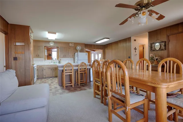 a view of a livingroom with furniture and a furniture