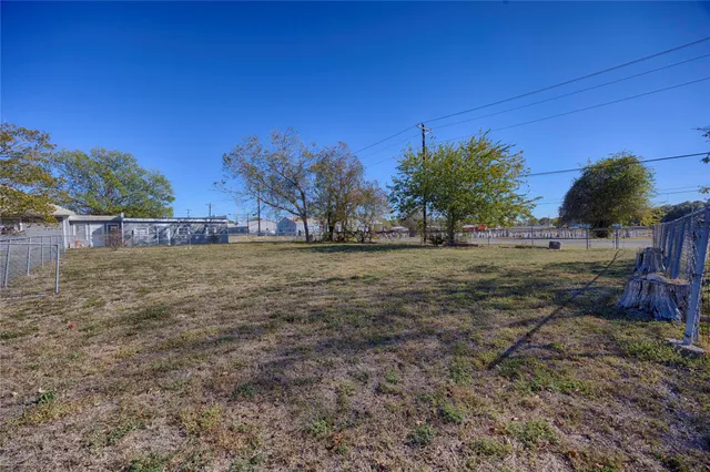 a view of a yard with an outdoor space