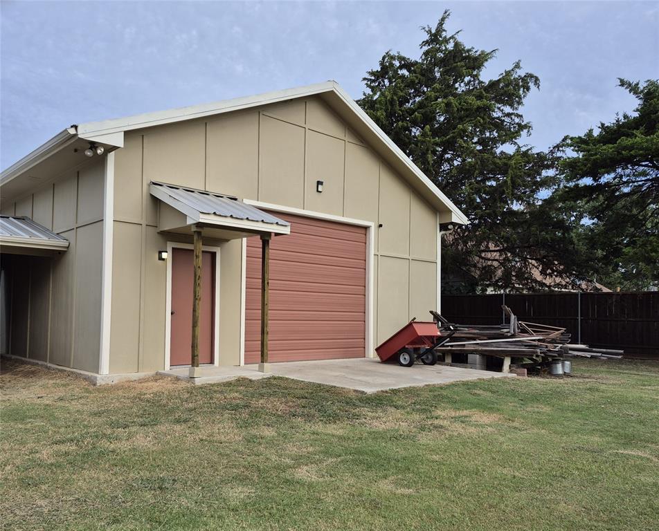 117 Maverick Trail Oak Point, TX 75068 - Photo 13 of 14 a front view of a house with parking space