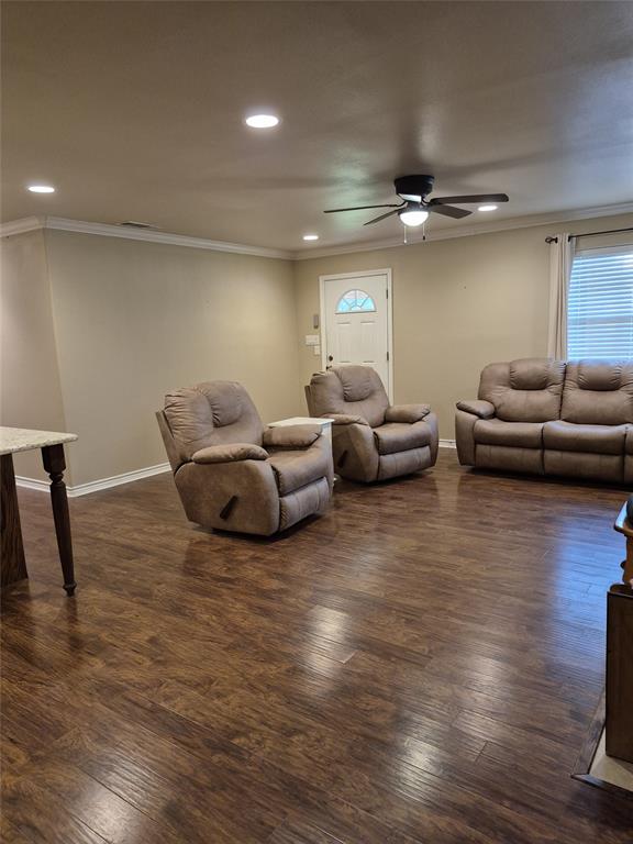 117 Maverick Trail Oak Point, TX 75068 - Photo 4 of 14 a living room with furniture and a wooden floor