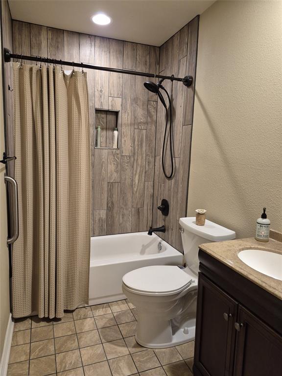 117 Maverick Trail Oak Point, TX 75068 - Photo 9 of 14 a bathroom with a sink toilet and shower