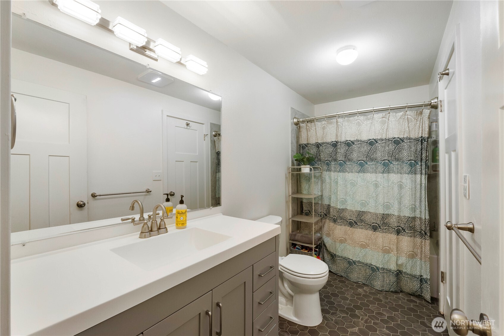 2322 Pamela Place Steilacoom, WA 98388 - Photo 12 of 24 a bathroom with a sink toilet and shower