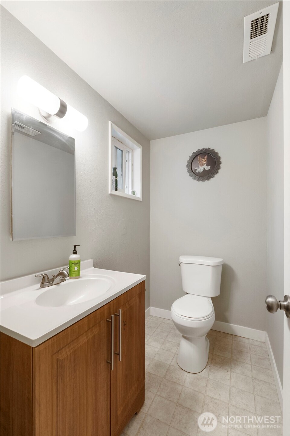 2322 Pamela Place Steilacoom, WA 98388 - Photo 15 of 24 a bathroom with a sink toilet and mirror