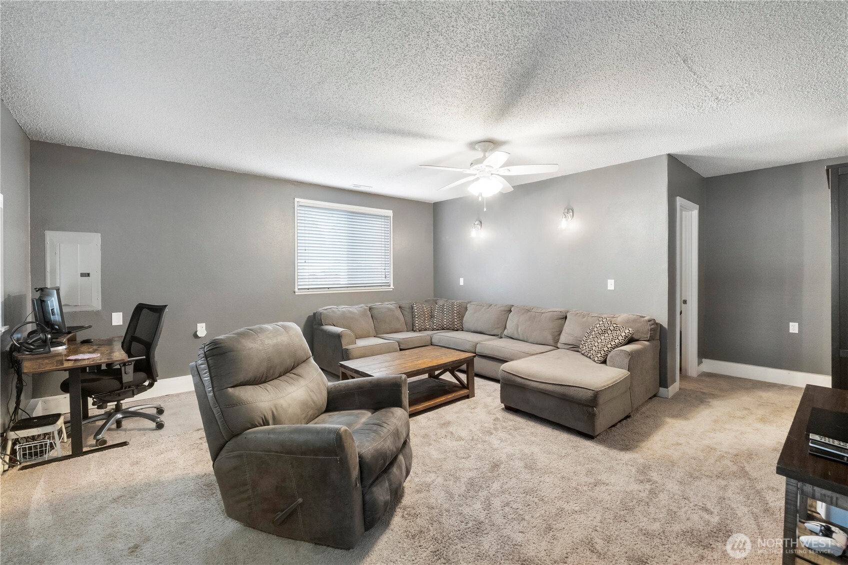 2322 Pamela Place Steilacoom, WA 98388 - Photo 17 of 24 a living room with furniture and a ceiling fan