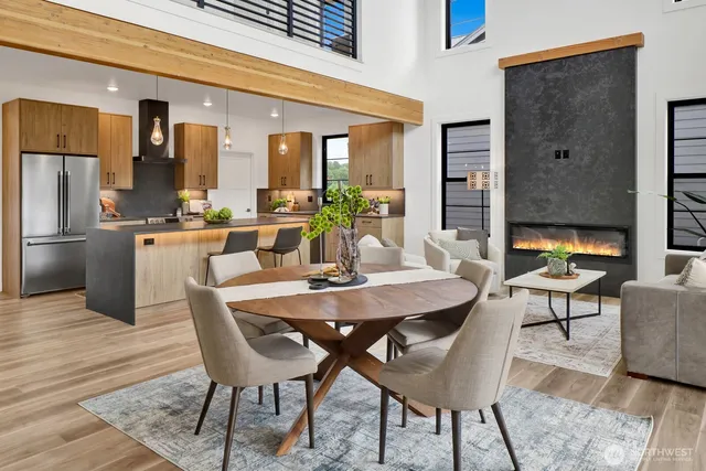 a open kitchen with stainless steel appliances granite countertop a stove and a wooden cabinets