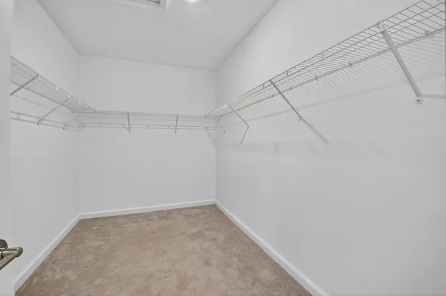 a view of a room with racks on the wall