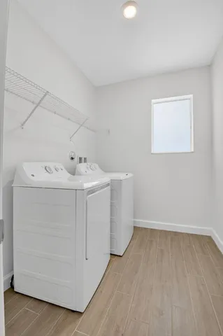 a utility room with dryer and washer