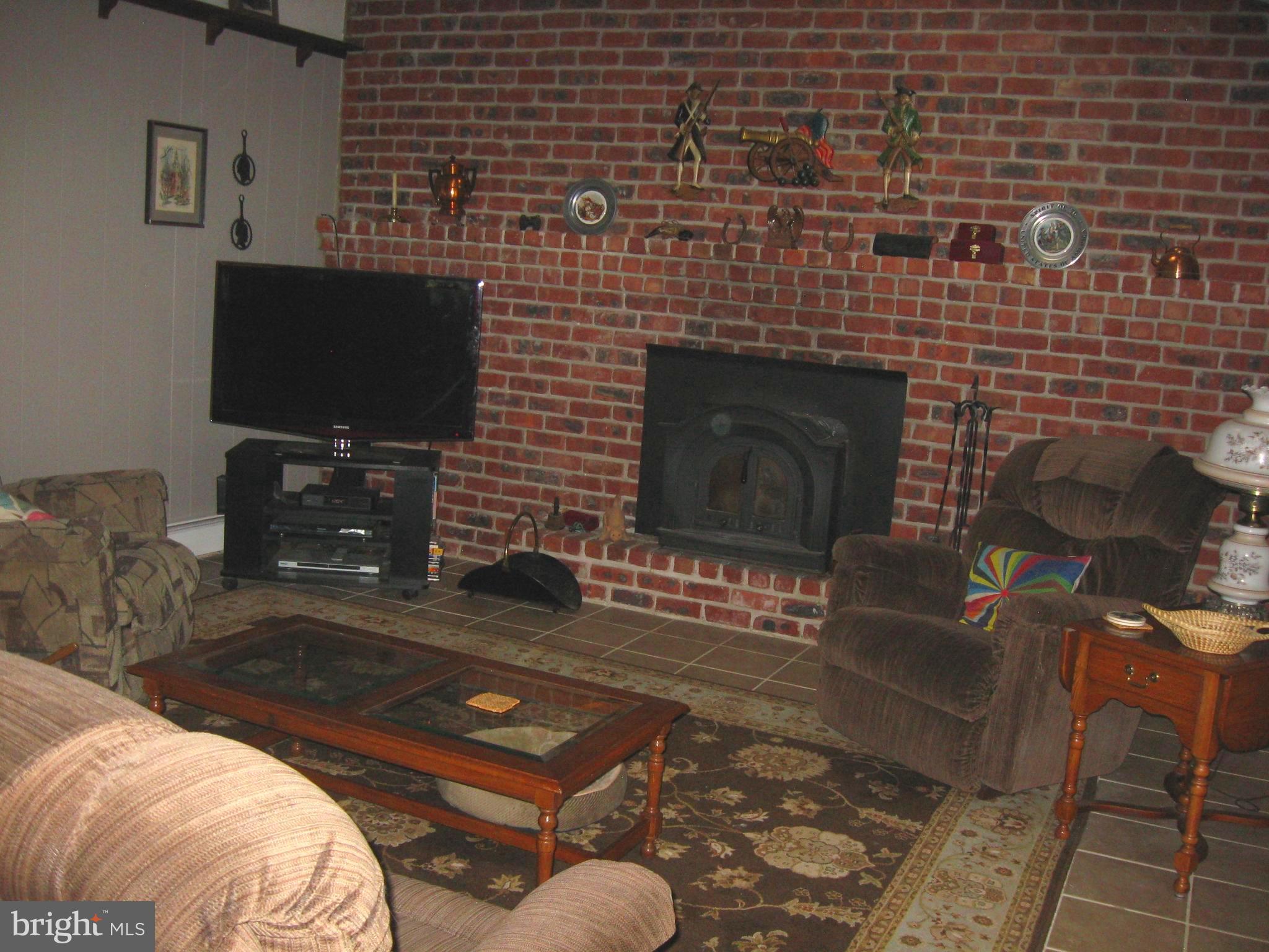 537 Highgate Road Eagleville, PA 19403 - Photo 5 of 9 Brick wall Fireplace with insert
