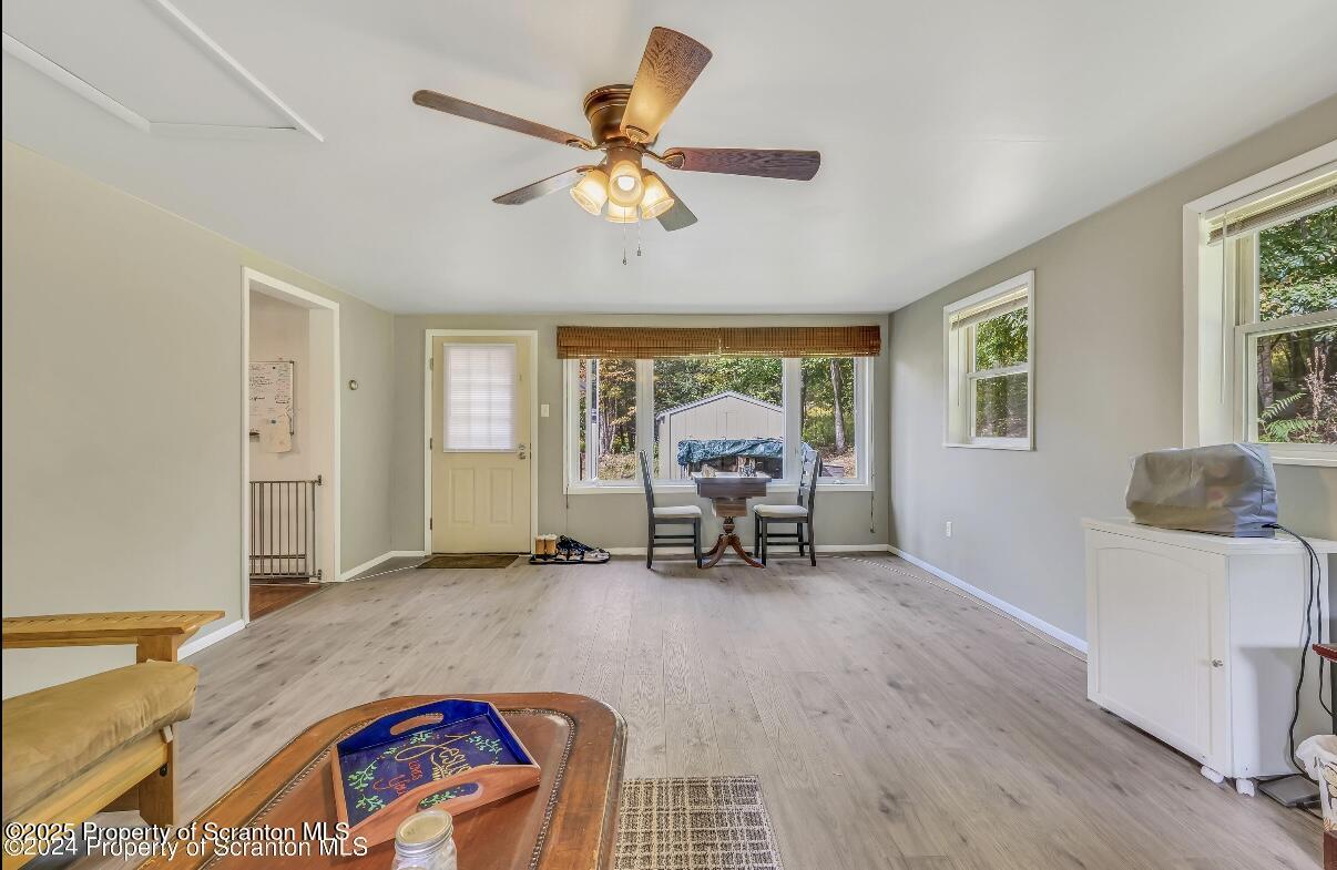 9311 Highway 3004 Springville, PA 18844 - Photo 15 of 51 a bedroom with furniture and a large window