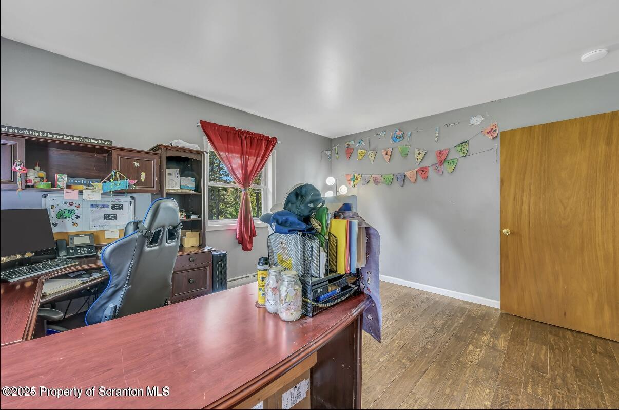 9311 Highway 3004 Springville, PA 18844 - Photo 24 of 51 a view of a kitchen with fridge and workspace