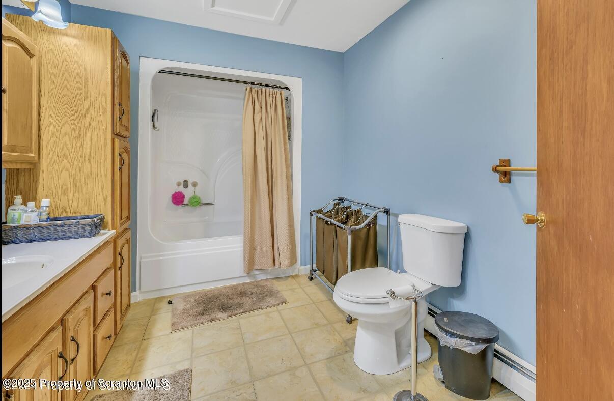 9311 Highway 3004 Springville, PA 18844 - Photo 27 of 51 a bathroom with a toilet and a shower