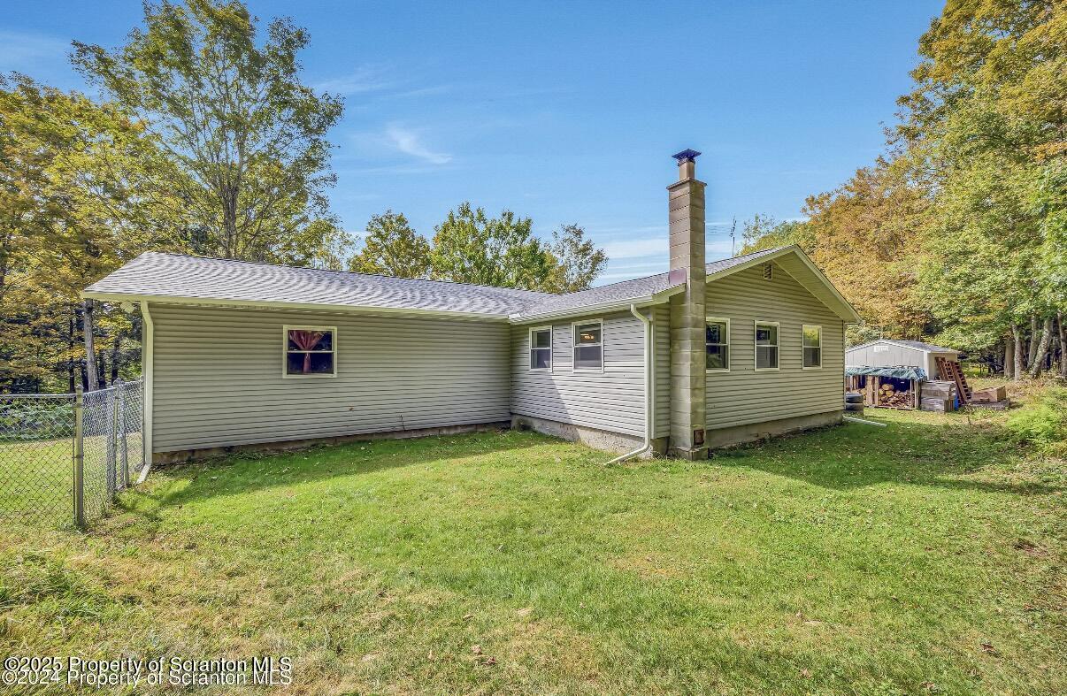 9311 Highway 3004 Springville, PA 18844 - Photo 3 of 51 a front view of house with yard and trees