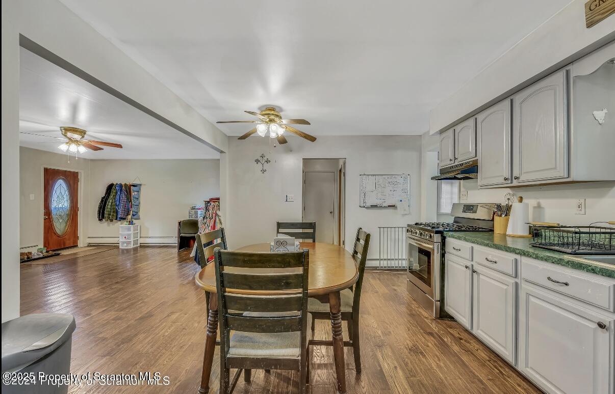 9311 Highway 3004 Springville, PA 18844 - Photo 10 of 51 a view of a dining room with furniture and wooden floor