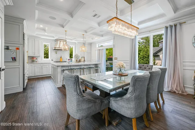 a spacious bathroom with double vanity sinks and a bathtub
