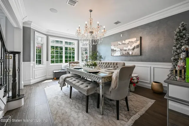 a bedroom with a bed and a rug