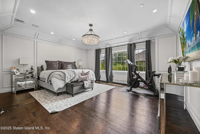 a view of a backyard with sitting area and furniture
