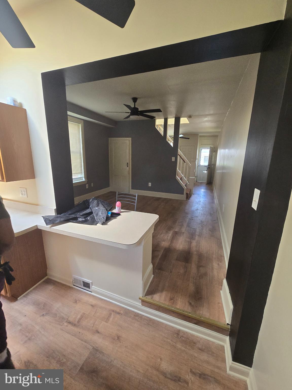 2118 Ruffner Street Philadelphia, PA 19140 - Photo 8 of 20 a bathroom with a sink a mirror and a bathtub