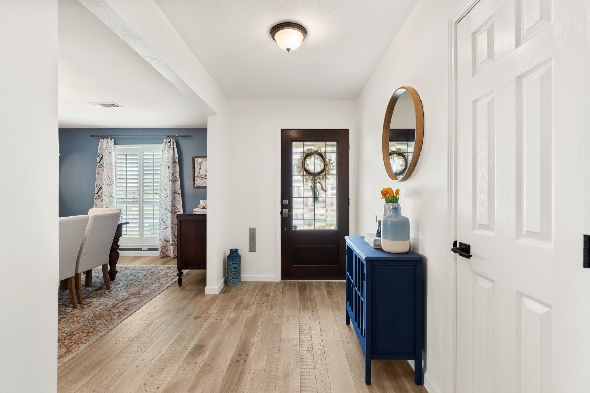 10619 Cranbrook Road Houston, TX 77042 - Photo 3 of 32 Step through the front door, and the first thing you’ll notice is the natural light streaming in.