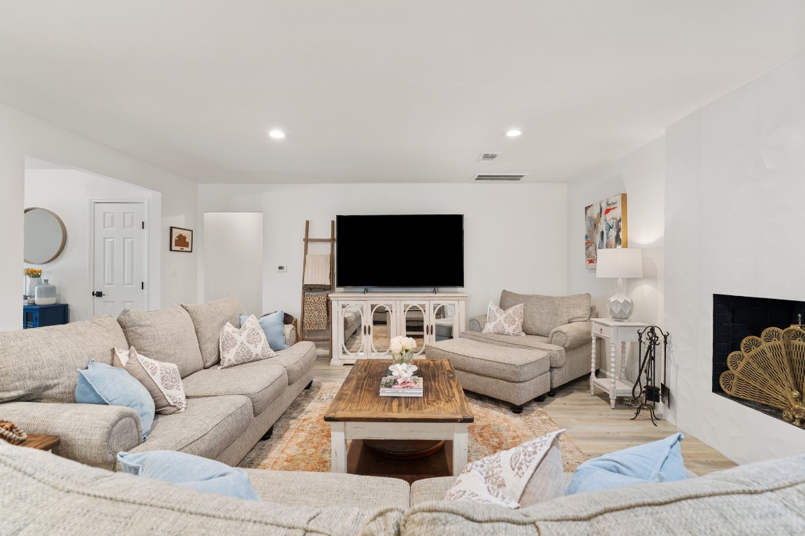 10619 Cranbrook Road Houston, TX 77042 - Photo 7 of 32 The generous family room serves as the heart of the home.