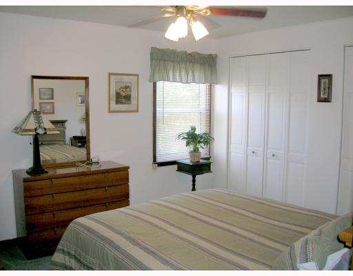 121 Leon Road Green Tree, PA 15220 - Photo 6 of 8 Master Bedroom. Master Bedroom with large closet, blue carpeting and white walls.