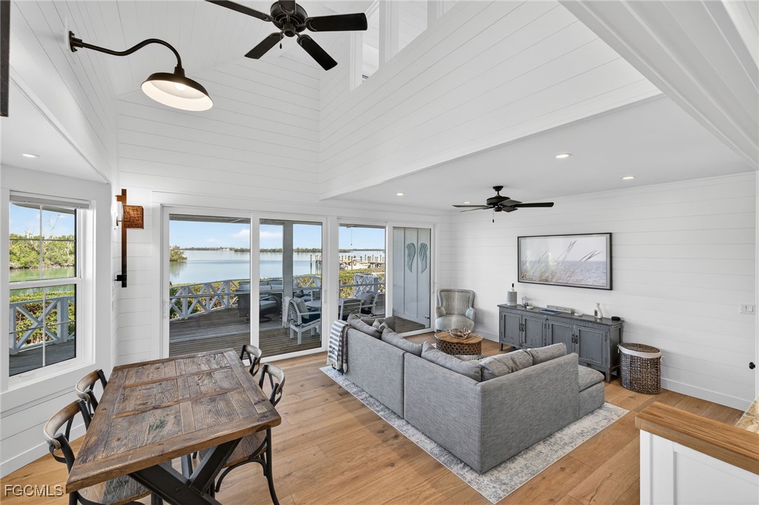 520 Useppa Island Bokeelia, FL 33922 - Photo 11 of 47 a living room with furniture and a flat screen tv