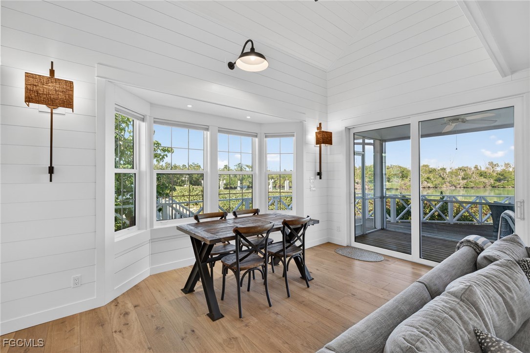 520 Useppa Island Bokeelia, FL 33922 - Photo 13 of 47 a living room with furniture and a large window